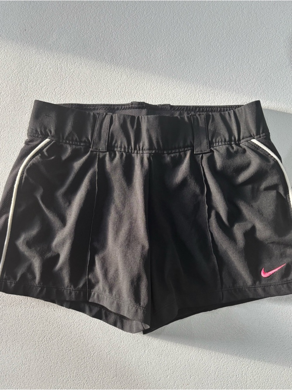 Nike Women’s Black Athletic Shorts with Pink Swoosh and White Trim